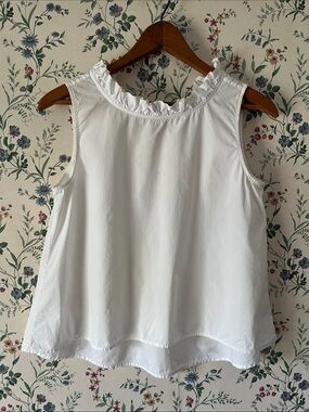 HD in Paris White Ruffle-Neck Sleeveless Crisp Cotton Hi-low Top